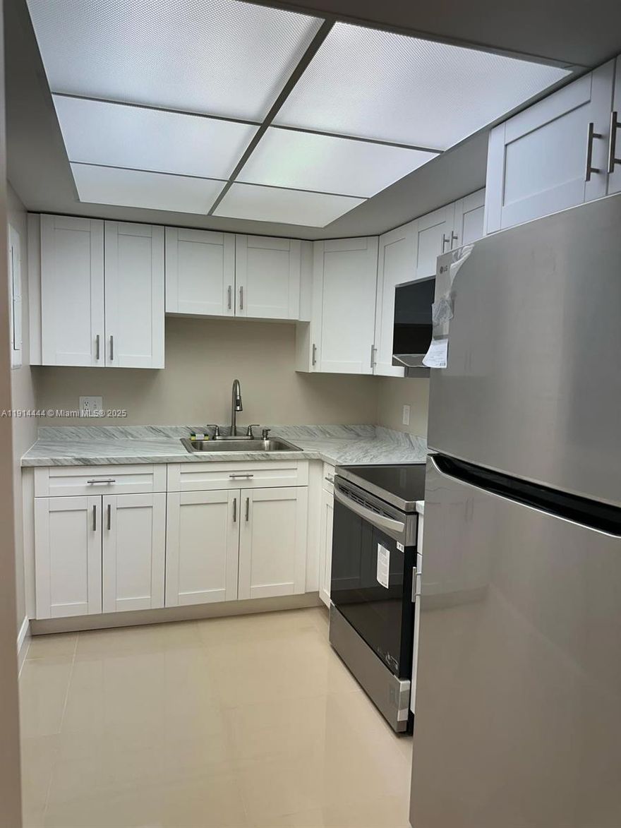 Discover this stunning, completely RENOVATED apartment, thoughtfully designed for those who appreciate style, comfort, and quality. Featuring beautiful porcelain floors, a brand-new kitchen with modern cabinets and premium appliances, and a sleek, contemporary bathroom, this home is the definition of move-in ready luxury.