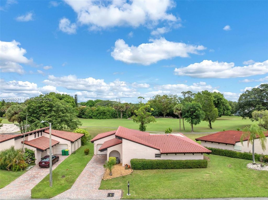 Photo of 8176 Pine Cir #6, Tamarac, FL 33321 (MLS # A12028271)
