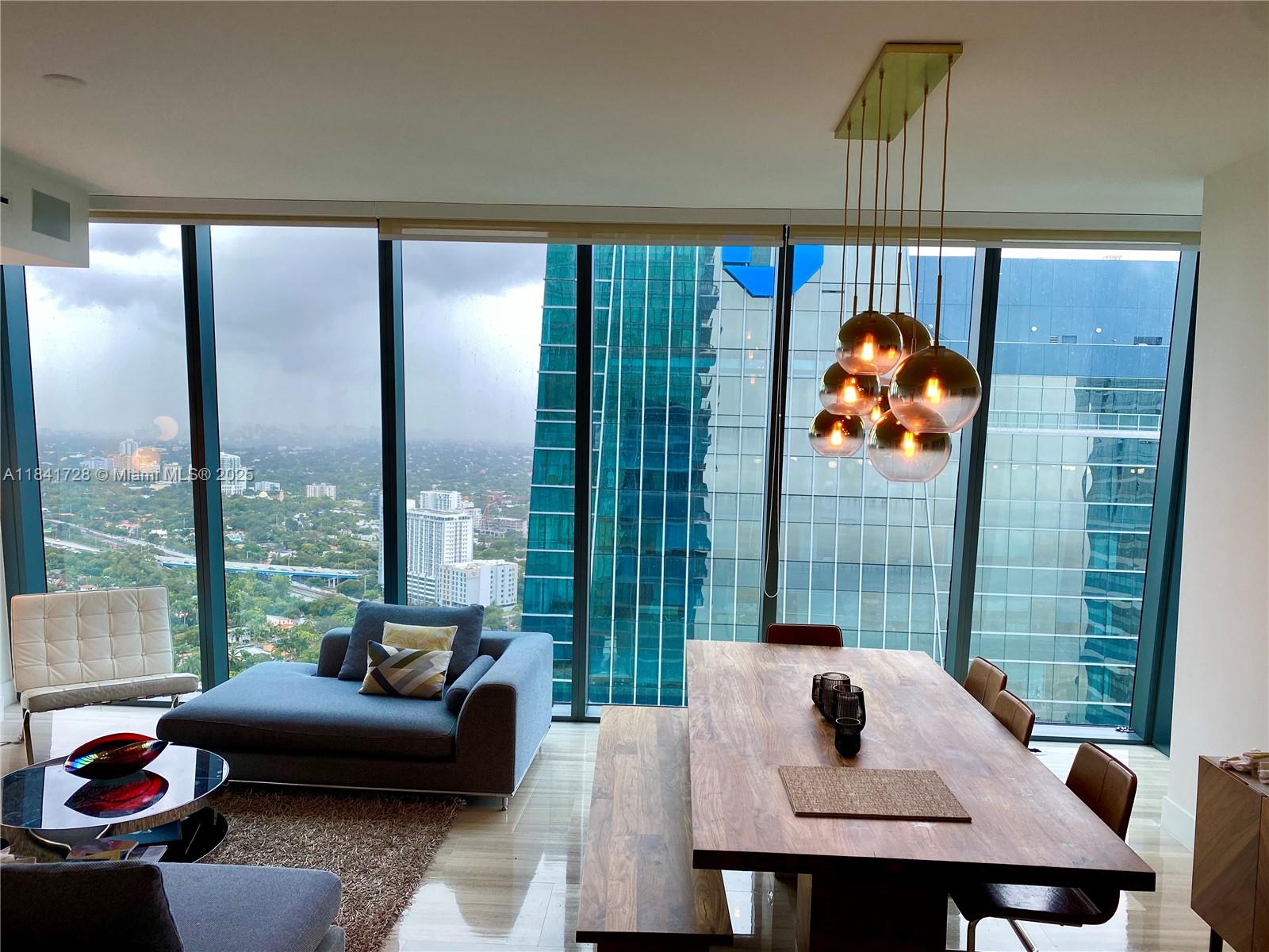2 BEDROOM, 2.5 BATH SMART APARTMENT WITH EXPANSIVE TERRACE THAT INCLUDES BUILT IN BBQ. UNIT FACES NORTH WEST WITH STUNNING VIEWS OF BRICKELL AND BISCAYNE BAY, WITH BREATHTAKING SUNSETS. UNIT HAS FLOOR TO CEILING WINDOWS, SHADES, ESPRESSO MACHINE, BUILT IN SMART SOUND SYSTEM THROUGHOUT, FULL SIZE WASHER/DRYER, AND TOP OF THE LINE APPLIANCES. 2 PARKING SPACES (VALET). ECHO IS ONE OF THE MOST EXCLUSIVE AND PRESTIGIOUS BRAND NEW BUILDINGS IN THE HEART OF BRICKELL. AMENITIES INCLUDE INFINITY VIEW POOL AND DECK OVERLOOKING BISCAYNE BAY, CITY AND DOWNTOWN MIAMI, 24/7 CONCIERGE, FULL-TIME CHAUFFEUR SERVICE BY APPOINTMENT, VALET, SECURITY, PET-WALKER, FULLY EQUIPPED GYM AND SPA. EASY TO SHOW!!