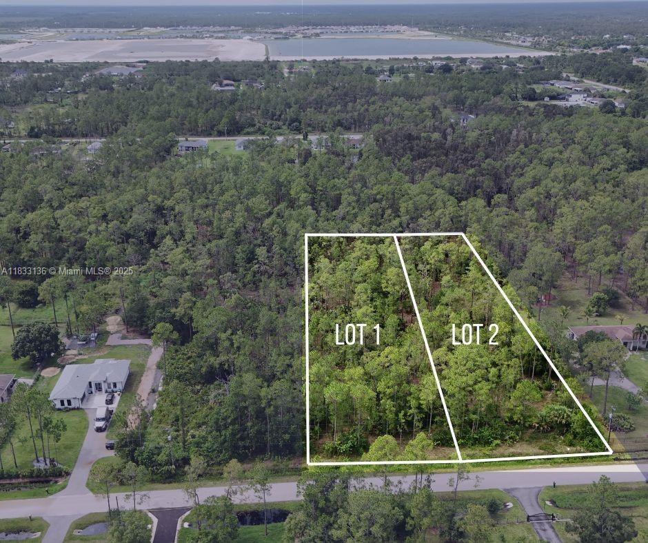 Incredible Development Opportunity in Golden Gate Estates!
Two adjacent 1.14-acre lots in Golden Gate Estates—can be sold separately or combined for 2.28 acres total! Build your dream home in this peaceful, high-growth area of Naples. Surrounded by lush greenery and mature trees, the lots offer space, privacy, and endless potential. Enjoy nearby shopping, dining, golf, and world-class beaches just a short drive away. A rare opportunity to own or invest in one of Southwest Florida’s most desirable locations. Don’t miss out!