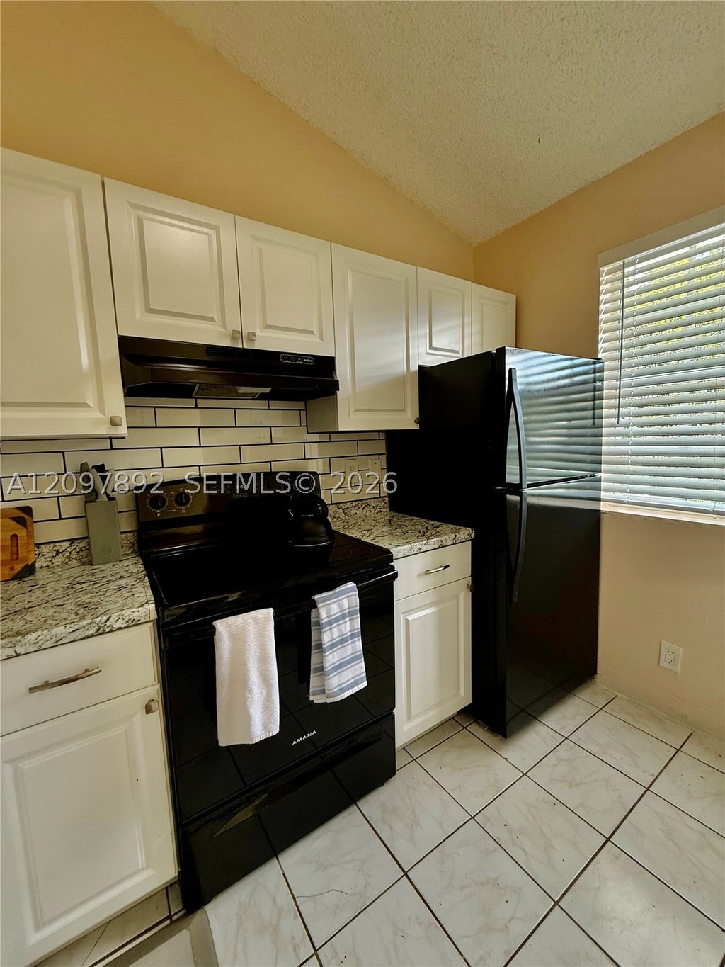 Photo of 4297 NW 114th Ter #4297, Coral Springs, FL 33065 (MLS # A12097892)