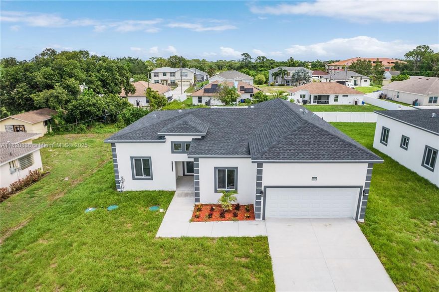 Beautiful New Construction Home in Lehigh Acres. This Charming Home Features 4 Bedrooms, 2 and a half Bathrooms 2 Car Garage. An Oversize Master Bedroom included walk in closets, dual sinks and a separate soaking tub. The open concept design 12 feet high Ceilings, ceramic flooring in main living spaces. Recessed lighting throughout the House The Kitchen is fully equipped with upgraded 42 cabinets and quartz Countertops. Step outside through a sliding glass door to the lanai Enjoy playing, relaxing and entertaining in your backyard.

The House is on Lock Box Call to schedule an appointment