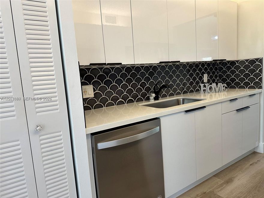 "AS IS"  Adorable 2/2 remodeled condo with private garden view.  New laminated floors, kitchen, and bathrooms with granite counter tops, appliances,  with washer and dryer inside unit.  Great location, close to I-75, Sawgrass expressway, Hospitals, restaurants, shopping centers and much more.