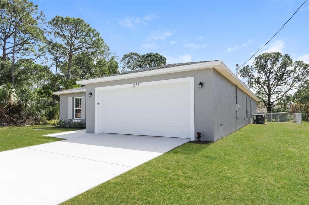 Photo of 226 SW Eyerly Ave, Port Saint Lucie, FL 34983 (MLS # A11712200)