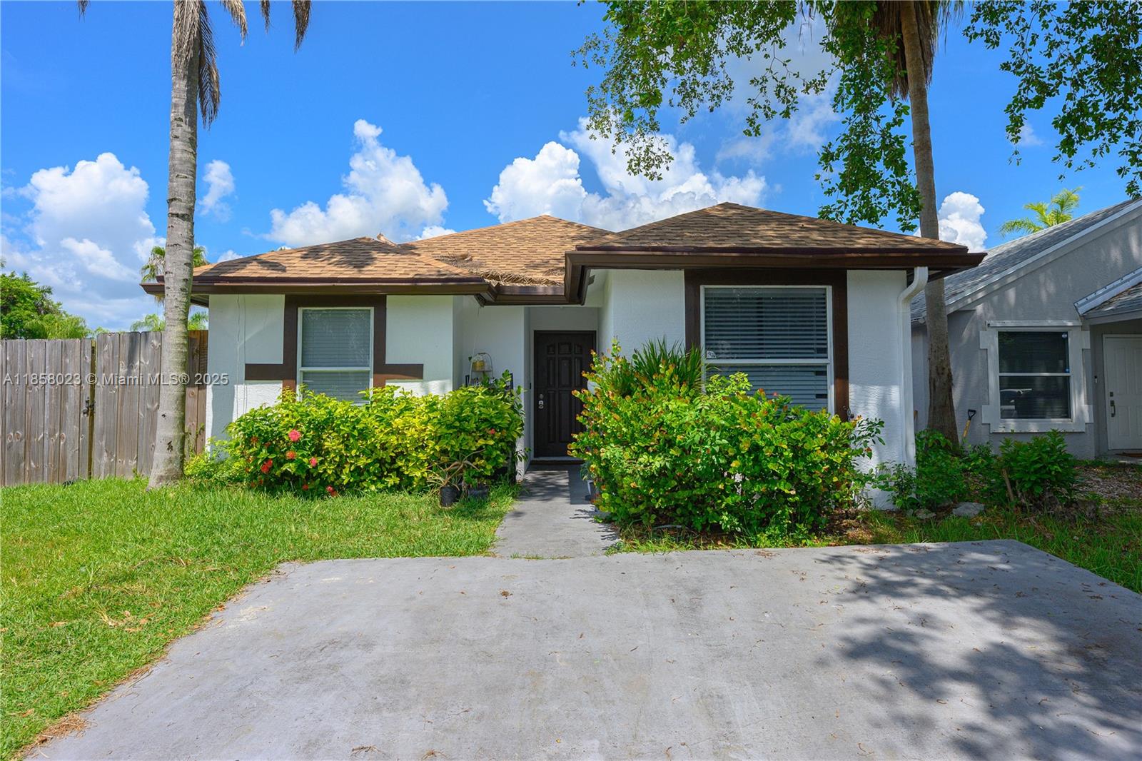 Florida City's Village of Palm Bay Community! This charming 4-bedroom, 2-bathroom corner home defines coziness while offering the space for your family's needs. Nestled in a quiet neighborhood, this property provides a peaceful retreat after a busy day. The proximity to nearby schools adds a layer of practicality for families with children. This residence is not just a home; it's a haven where tranquility meets functionality. Seize the opportunity to make this property your own now! When using preferred lender a $5000 incentive will be provided to buyer.