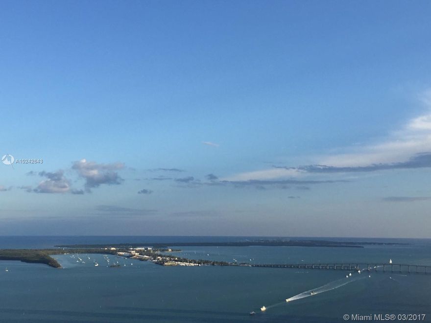 Endless Bay, Ocean and City views from this spacious corner unit on the top of the luxurious Tower II of the Icon Brickell building.  Many upgrades, white marble floors, State-of-the-Art appliances, Hunter Douglas electric blinds,  impeccable finishes, unit is in immaculate conditions.  Building amenities including Spa, gym, pool, clubhouse.  Walking distance to restaurants, office buildings and shopping area. Vacant and move-in ready, easy to show.