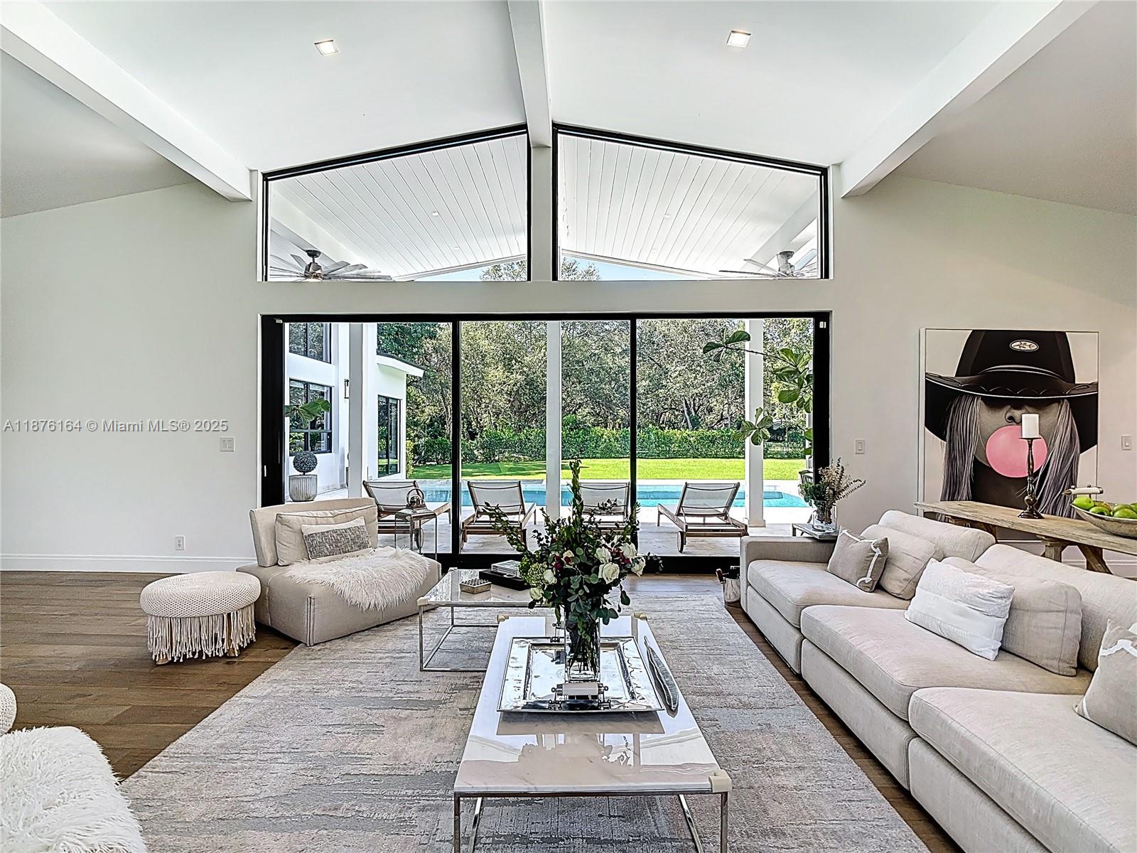 Nestled on over an acre of lush, private grounds in sought-after Pinecrest, this stunning 5-bedroom, 5.5-bathroom residence offers over 6,000 square feet of elegant living space designed for comfortable family life and entertaining.
Step inside to discover a beautifully updated interior featuring a brand-new kitchen with premium finishes, spacious living areas filled with natural light, and a seamless indoor-outdoor flow. The home’s transitional style blends clean lines with warm accents, creating an inviting yet refined atmosphere. The oversized backyard offers endless possibilities.
In one of South Florida’s most desirable neighborhoods, this home is minutes from top-rated schools, parks, and dining—ideal for families seeking luxury, space, and convenience in a prime location.