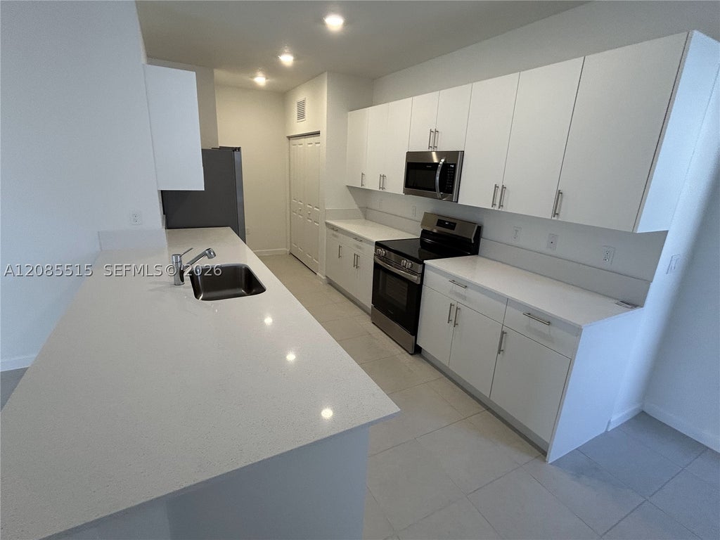 Photo of 3000 Park Pl, Dania Beach, FL 33312 (MLS # A12085515)
