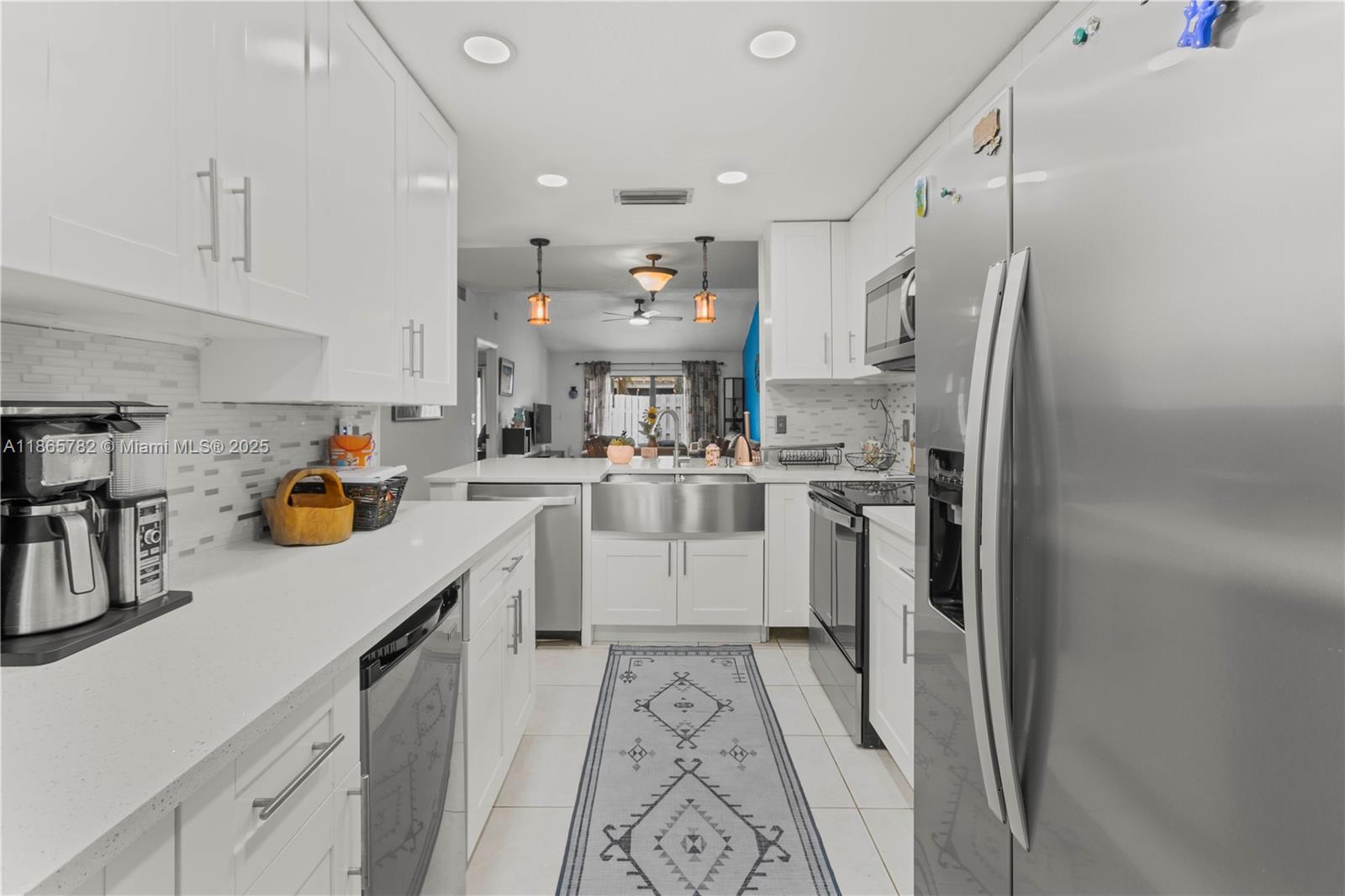 Beautifully updated 3BR/2.5BA townhome in the desirable Tanglewood community of Pembroke Pines. This spacious residence offers a bright open layout with tile flooring, fresh interior paint, and contemporary light fixtures. The modern kitchen is equipped with an open layout concept, stainless steel appliances, and ample cabinetry. The primary suite is conveniently located on the first floor. Enjoy outdoor living on the fenced-in, private patio. Additional features include washer/dryer, hurricane panels, an assigned parking space, and plenty of guest parking. Residents have access to the community pool. *** Can be rented fully furnished. Vacant. Schedule on ShowingTime. TEXT listing agent with any questions. ***
