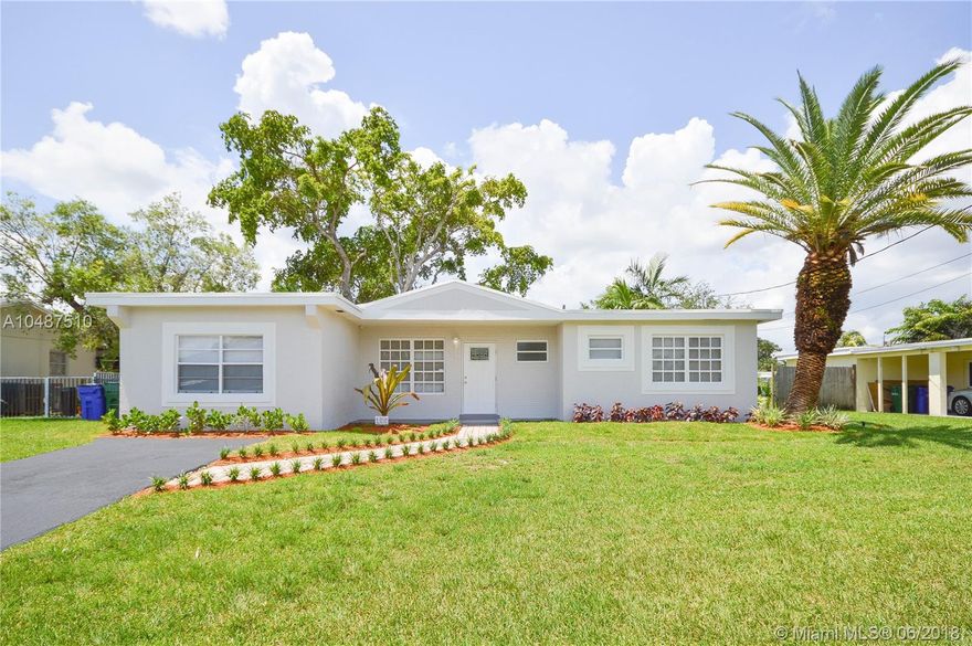 Beautifully renovated 3 bedroom 2 bath single family home, with side family room or fourth bedroom.  Upgraded custom kitchen with granite counter-tops, new stainless steel appliances, renovated baths, new interior/exterior doors, new laminated wood floor and new baseboards throughout, new light fixtures, repainted interior/exterior, new custom landscaping, screened terrace overlooking a large lot and serene canal front site.  Won't last!!!