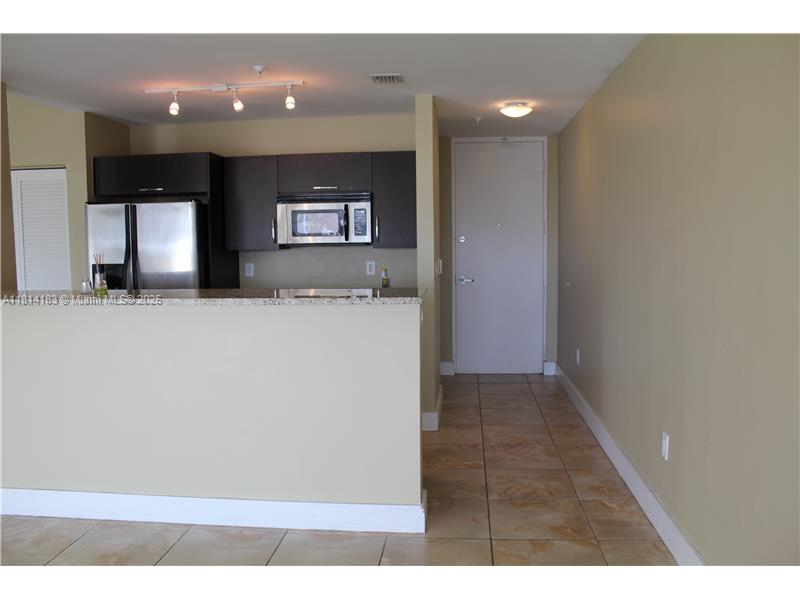 LOFTS IN THE GROVE CONDO - Residential Lease