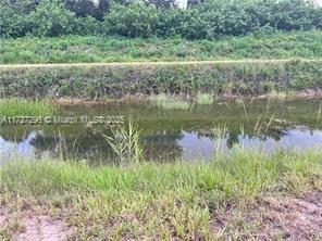Looking for the ideal spot to build your future home? Look no further! This property in fast-growing East Lehigh Acres offers a unique advantage: no neighbors across the street, thanks to the canal. There’s a well ready placed. Don't pass up this opportunity! With easy access to SR82, I-75, schools, restaurants, and beaches, it's a prime location. Swing by and make your offer today!