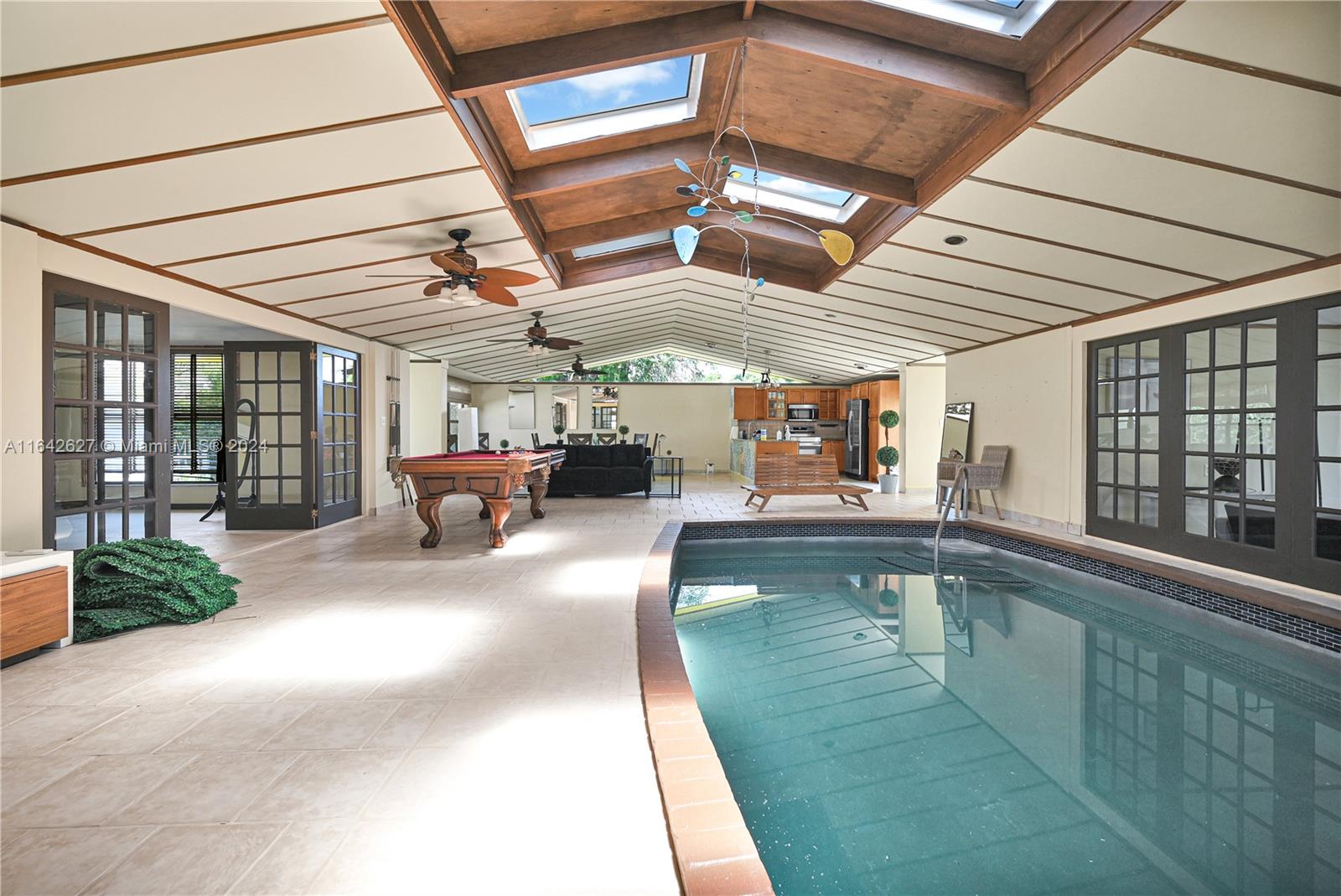 2915 Arthur St - A Coastal Gem
This one-of-a-kind 3-bedroom, 2.5-bathroom home, with over 2,800 sq. ft., sits on a tranquil, oversized cul-de-sac lot with 125 feet of ocean-access frontage. Custom-built for privacy and entertainment, this residence offers a unique lifestyle. The highlight is a private indoor natatorium, featuring a pool in the heart of the living room. Ideal as a personal retreat or a lucrative vacation rental, this property is meticulously designed to blend indoor and outdoor living for an exceptional experience.
