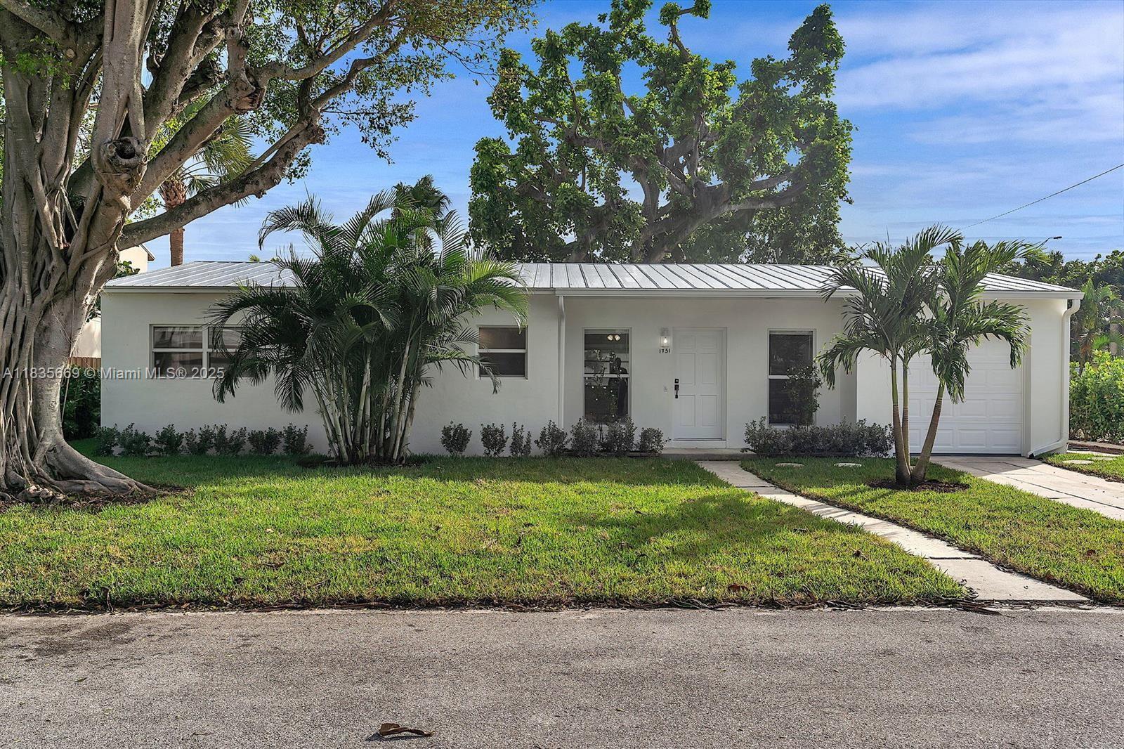 Bright & fresh updated 3 bedroom home for lease now! Perfect North Lake Worth Beach location on a quiet dead end street near parks with tennis, basketball, PICKLEBALL, playgrounds, baseball & soccer fields. New LVT wood look flooring throughout, fresh paint, new kitchen + appliances, updated guest bathroom plus one bedroom with ensuite bath. Spacious living areas & great storage space. Nice backyard with patio & shade tree, 1 car garage with laundry plus driveway with room for a boat or trailer (no HOA restrictions). Qualified tenants with good credit score & proof of income. First and Last month rent plus one month security deposit required. Owner will consider pet (no aggressive breeds) with pet fee. Landscaping included, tenant pays all other utilities.