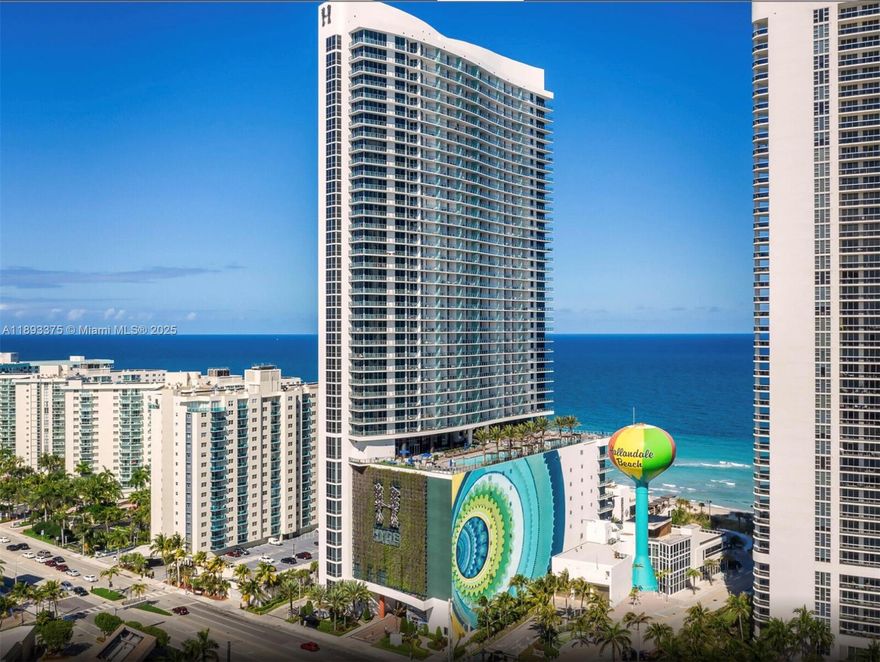 Prime corner unit with breathtaking ocean and beach views! This stunning 1-bedroom, 1-bath residence boasts a spacious balcony, is fully furnished, and comes equipped with everything you need. Includes in-unit washer and dryer and valet parking. Enjoy top-tier amenities such as a pool, luxury spa, bar, gym (on the 9th floor), coffee shop, beach services, and more! M Easy to show!