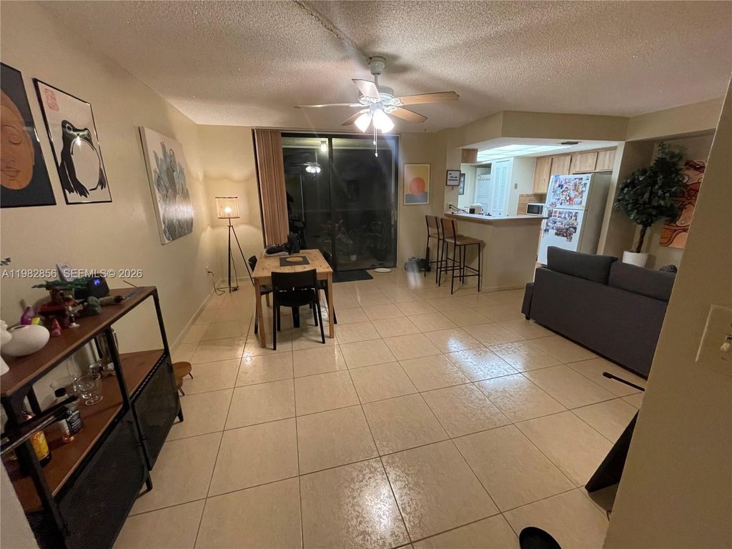 Photo of 6800 Cypress Rd #305, Plantation, FL 33317 (MLS # A11982856)