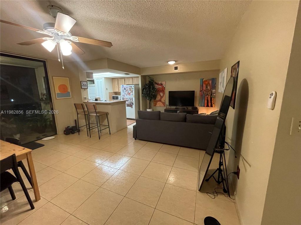 Photo of 6800 Cypress Rd #305, Plantation, FL 33317 (MLS # A11982856)