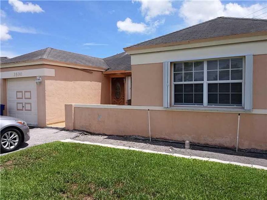 Great home in Miami Gardens 4 bedrooms, 2 bath 1460 sq. ft, garage is a den, large back yard, no association, great community centrally located. Short sale approved.
