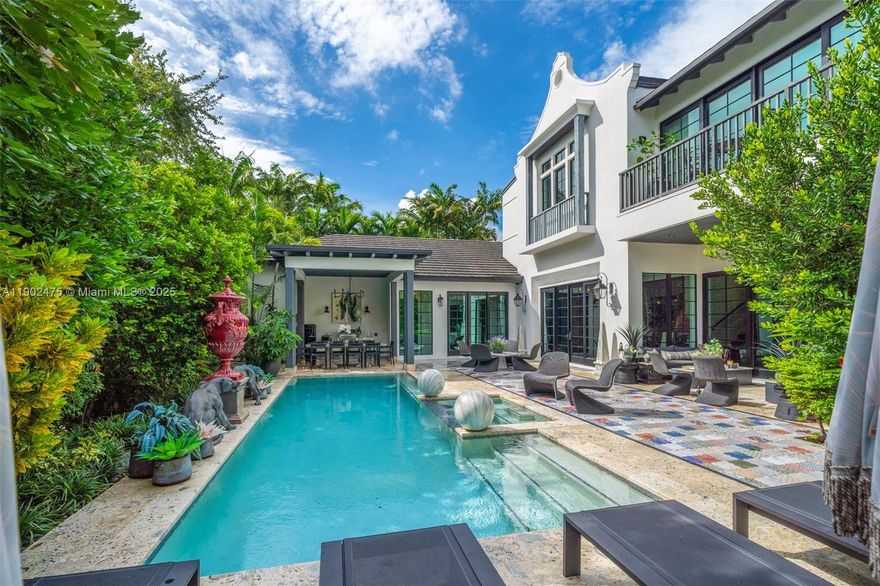 Discover luxury living in the heart of Gated Morningside — a refined 4 bds, 4.5 baths turnkey fully furnished residence built in 2016 boasting 4,664 sq ft of beautifully designed interior space and nestled on an 8,400+ sq ft corner lot. Meticulously crafted with oversized ceilings and exceptional finishes, this home features a gourmet kitchen with a 12-ft marble island, a serene primary suite with private garden balcony overlooking the enchanting pool & backyard creating a true Miami sanctuary. Just steps from the bay, lush parks, the vibrant Design District, this home offers immediate access to fine dining, top schools, and coastal lifestyle amenities. Experience upscale modern living in a prime, historic neighborhood setting — this is your turn-key, urban oasis in Miami’s elite enclave.