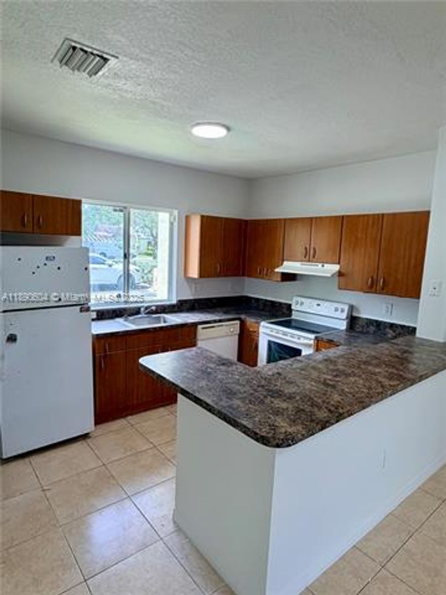 UPDATED SPACIOUS 2 STORY CORNER UNIT, 3 BEDROOM, 2.5 BATHS TOWNHOUSE WITH LARGE FENCED-IN PRIVATE BACKYARD, TILE FLOORS DOWSNTAIRS, NEW CARPETED FLOORS SECOND FLOOR UPSTAIRS IN BEDROOMS, WASHER/DRYER IN UNIT. QUIET COMMUNITY MIXED WITH SINGLE FAMILY HOMES, CENTRALLY.  PETS OK.  AFFORDABLE HOUSING APPROVED.