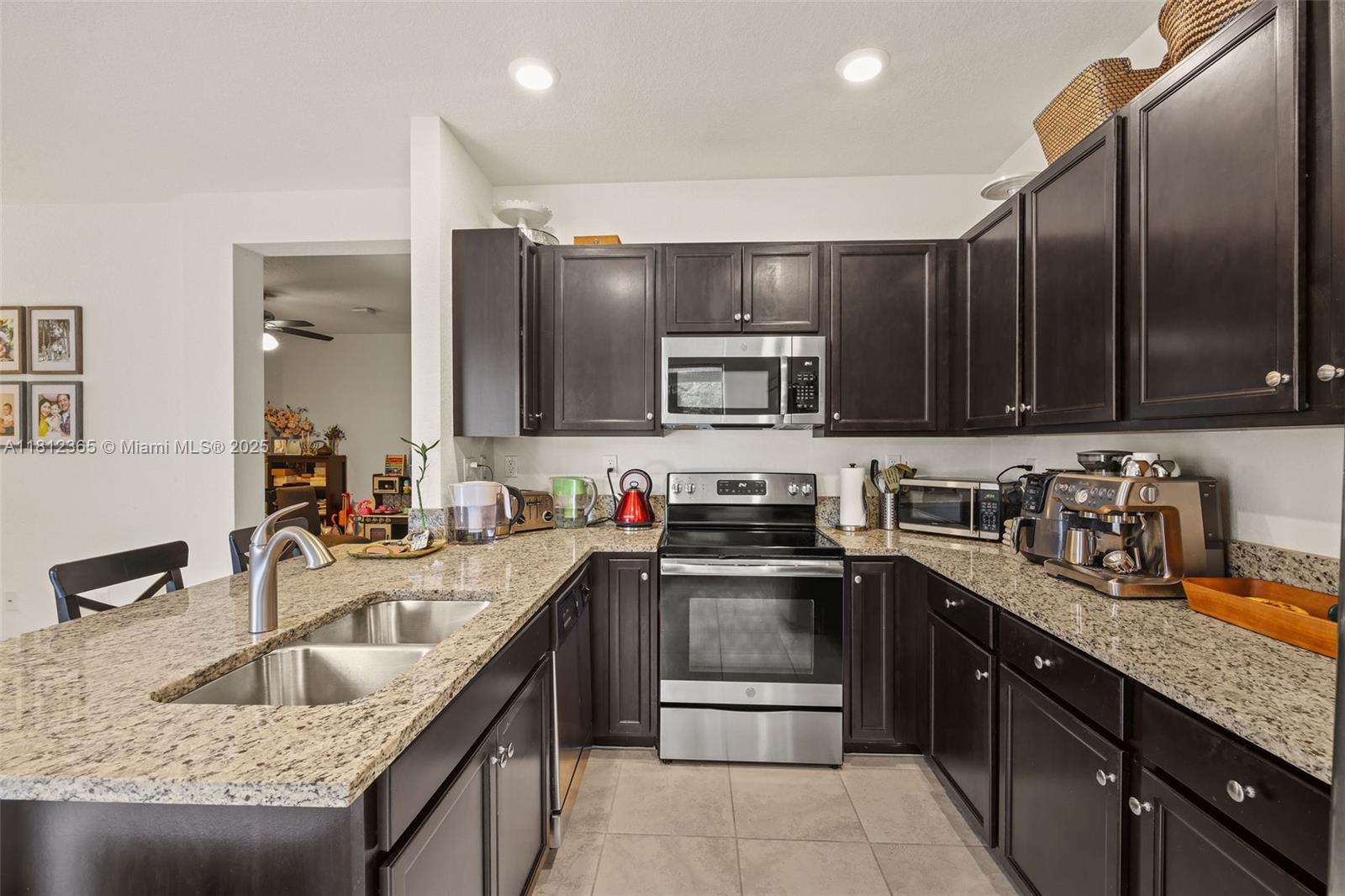 AQUABELLA – MUCH SOUGHT AFTER 4/2.5 with GARAGE on Special lot across from park/green area!
Granite/Wood Kitchen, Stainless Appliances, Elec Garage Door Opener & nice Paver Patio.
Enjoy Resort Style Clubhouse!! HURRY THIS ONE WON’T LAST!!