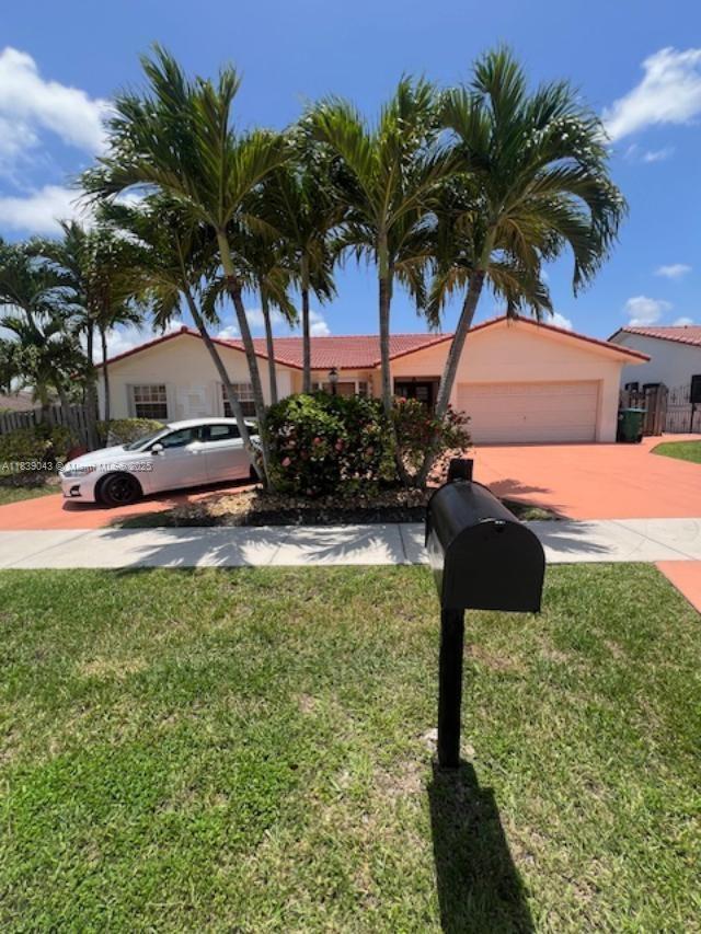 Don’t miss this beautifully maintained single-family home on a desirable oversize corner lot, This 3-bedroom, 2/1 bath residence is in a sought-after neighborhood and features a Entry foyer, large family room, living room, formal dining rooms, kitchen and offers a spacious layout perfect for everyday living and entertaining. The oversized patio offers endless possibilities to build your dream pool, create an outdoor retreat, or park your boat or RV. The home combines indoor comfort with outdoor flexibility, perfectly suited for a family. Ideally located just minutes from the Turnpike and close to shopping centers, dining, and more. A rare find that blends pride of ownership, prime location, and true potential. All impact Doors (PACE). Contact Listing Agent for appointment.