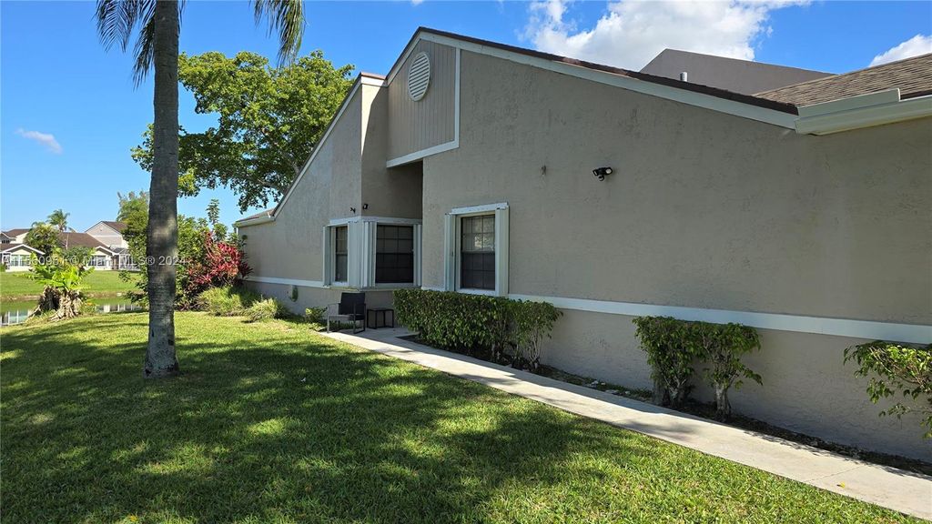 Photo of 5021 NW 11th Way #5021, Deerfield Beach, FL 33064 (MLS # A11560951)