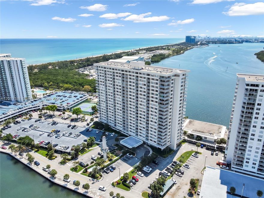 Own your slice of paradise by the beach and wake up to breathtaking sunrise views from this 2-bedroom, 2-bathroom fully remodeled corner unit in beautiful Sunny Isles. This spacious condo features a brand-new kitchen with modern cabinetry, quartz countertops, and new stainless steel appliances including a Fisher & Paykel refrigerator. Both bathrooms exquisitely remodeled. Unit also features impact windows and new tile flooring throughout with elegant neutral tones. The space offers a bright, airy ambiance with abundant natural light and ample storage.  Step out onto the expansive wraparound balcony and take in breathtaking water and city views. Perfect for relaxing and entertaining. Furniture negotiable. 

Vacation lifestyle! The building features a resort-style heated pool overlooking the bay, tennis courts, billiards, gym, library, nail salon, mini-market, 24-hour concierge service at the front desk, security, and more! Includes cable, internet/Wi-Fi, insurance, water, and sewer. Community marina accommodates up to 80 boats - perfect for boating enthusiasts. Includes assigned covered parking, guest parking, and valet service for added convenience.

Ideally located just moments from parks, shops, restaurants, the beach, and easy access to public transportation. 50-year inspection completed. No current assessments.  This condo offers the ultimate beach lifestyle.   Don't miss this one. Easy to show!!!