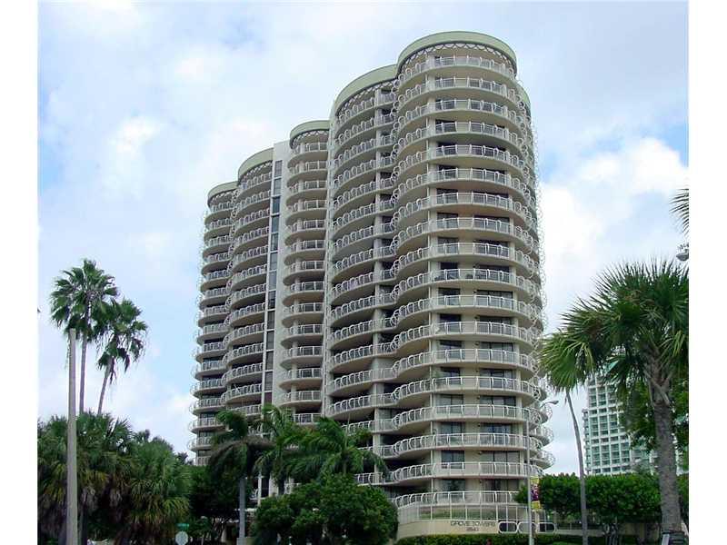 Best opportunity to live in the heart of Coconut Grove at an affordable price! Grove Towers is an avant-garde bldg. located directly across from the Bay & Marina and is steps to all of the Grove's shopping, dining, & entertainment hot spots. Unit features : walls of continuous floor-to-ceiling glass, enormous wraparound terraces w/access from every room, spacious living areas, and a floor plan that makes the unit feel much larger than its square footage. There is no other inventory on the market like this!