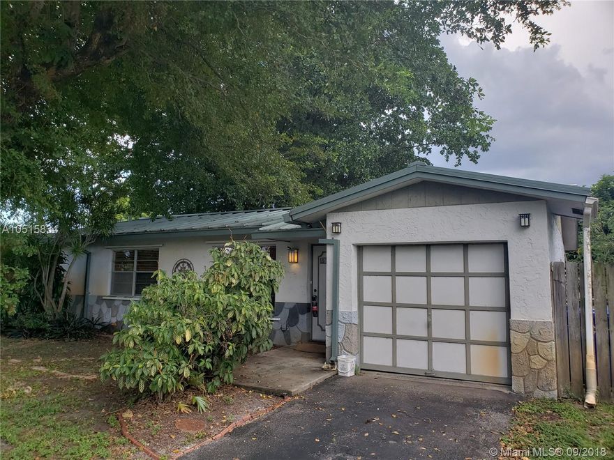 Come see this 3 bed / 2 bath, one car garage with large back yard, home is centrally located in the heart of North Lauderdale. Home is tile throughout with laminate floors in the living room. Come put your personal touch and make this home your home sweet home. WILL NOT LAST!!!!!