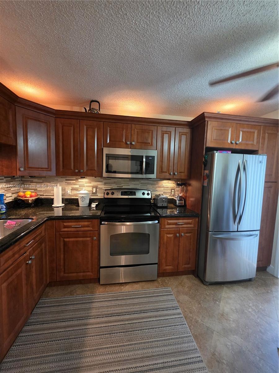TARTAN COCONUT CREEK PHAS - Residential