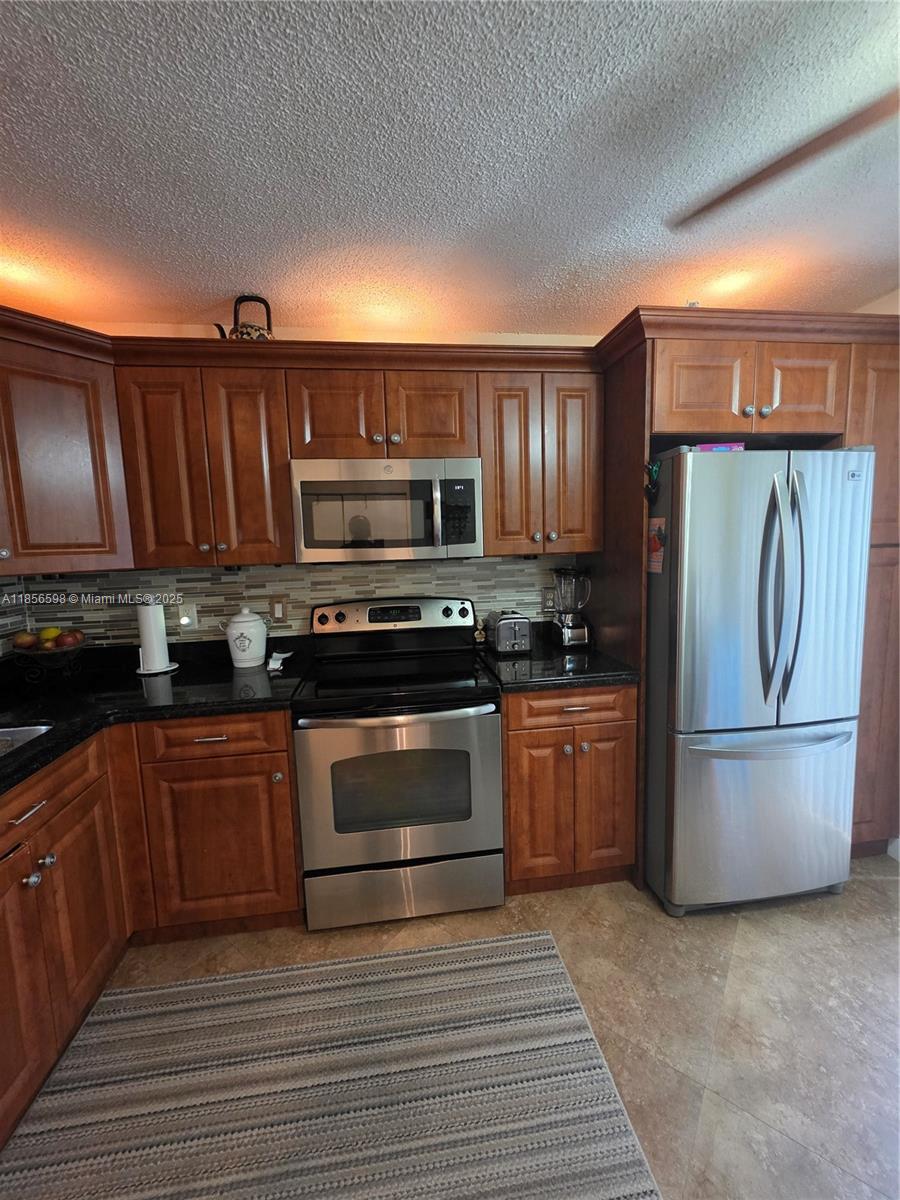 TARTAN COCONUT CREEK PHAS - Residential