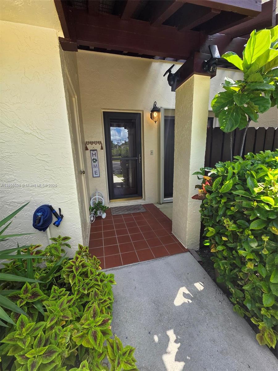 PERFECT OPPORTUNITY FOR YOU TO PURCHASE IN THE MUCH SOUGHT AFTER COMMUNITY OF RAINTREE IN THE TARTAN COCONUT CREEK COMMUNITY. OWNERS HAVE OUT GROWN THIS UNIT AND NEEDS MORE SPACE. THIS BEAUTIFUL UNIT FEATURES A FULLY UP GRADED EAT IN KITCHEN WITH A BREAKFAST BAR, DINING/LIVING DOWN STAIRS, AN HALF BATH AND SCREEN ENCLOSED PATIO WITH A LOVELY LAKEVIEW. THE LARGE TWIN MASTER SUITES ARE LOCATED UPSTAIRS WITH WALK IN CLOSETS. THE SAMSUNG WASHER AND DRYER ARE LOCATED ON THE FIRST FLOOR AND ARE NEW 2025. THE WATER HEATER IS ALSO NEW 2025. ***SELLERS MAY REQUIRE A LEASE BACK FOR 30/60 DAYS AFTER CLOSING***