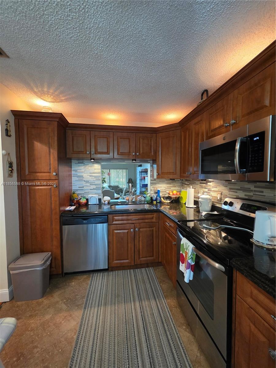 TARTAN COCONUT CREEK PHAS - Residential