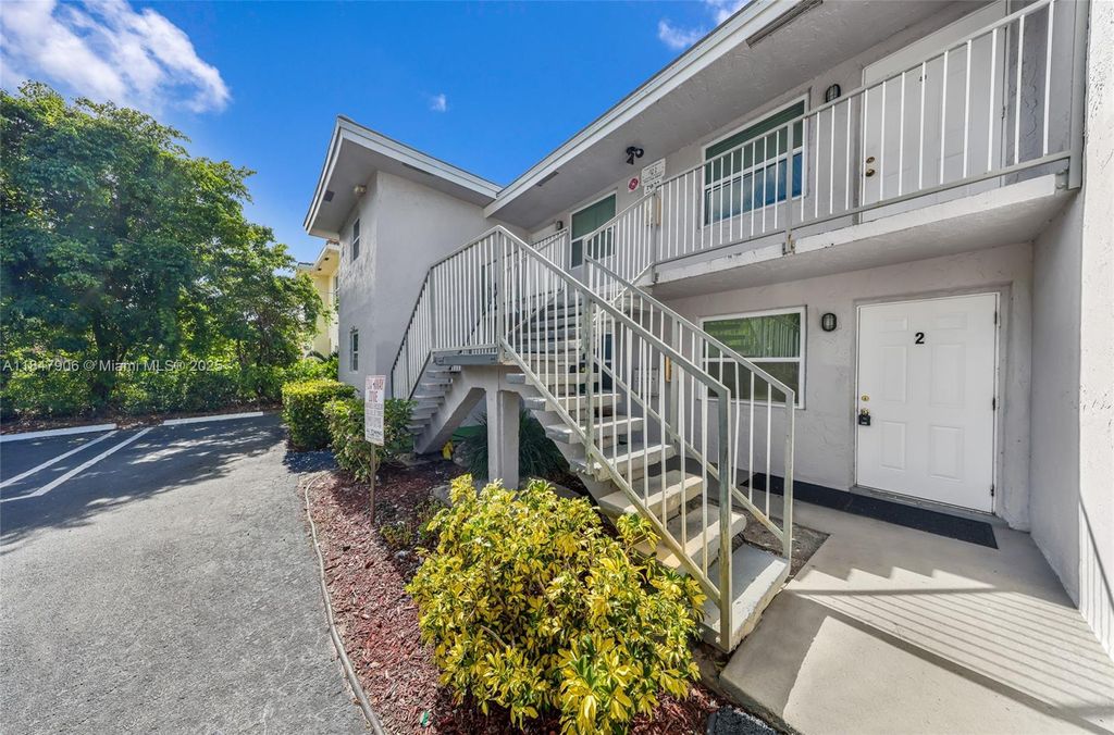 Photo of 7921 NW 44th Ct, Coral Springs, FL 33065 (MLS # A11847906)