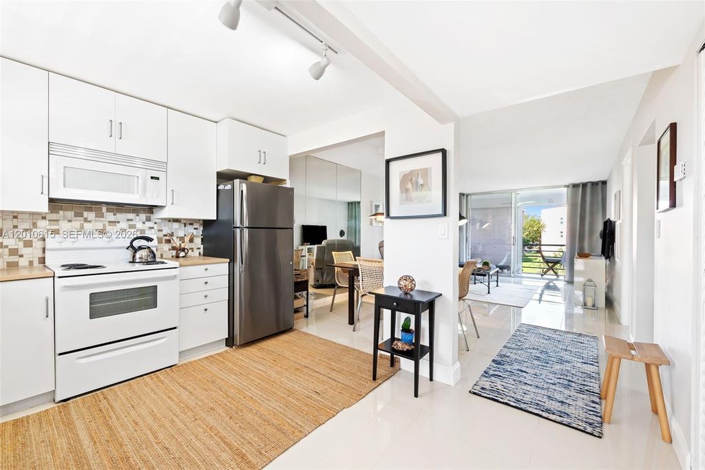 Photo of 9421 Sunrise Lakes Blvd #208, Sunrise, FL 33322 (MLS # A12010615)