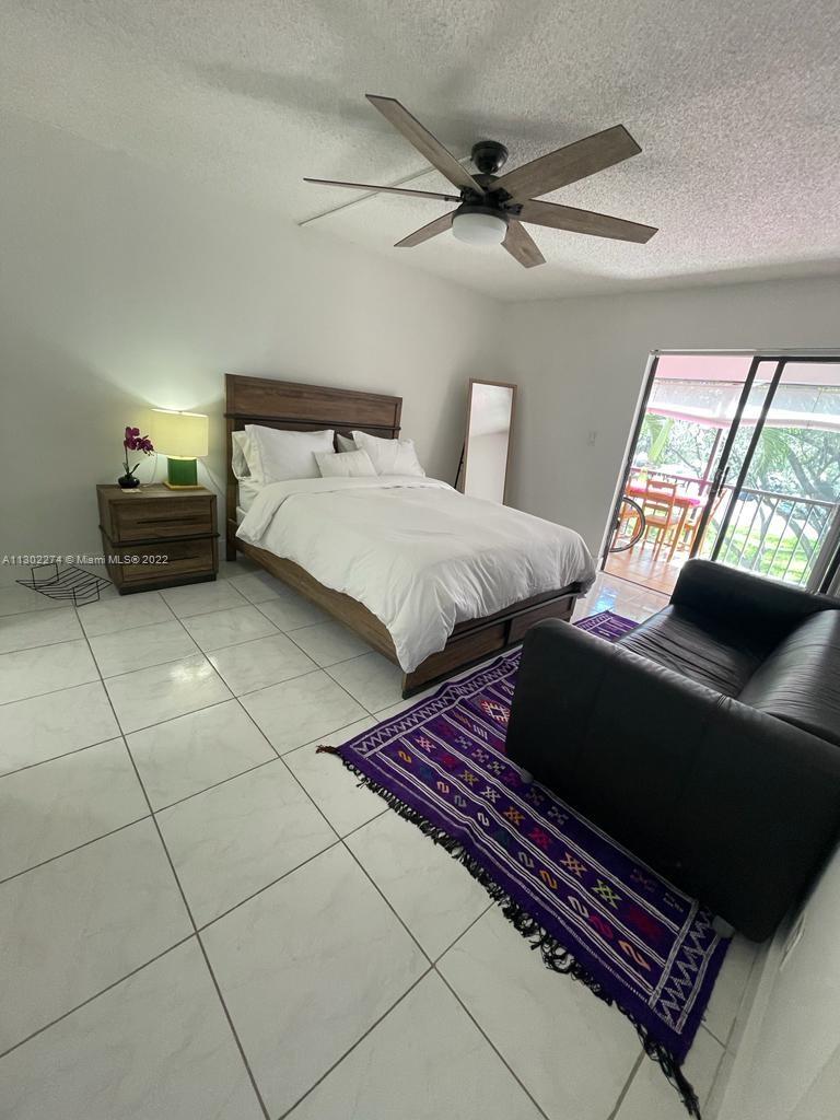 BUILDING FOUR OF RACQUET - Residential Lease