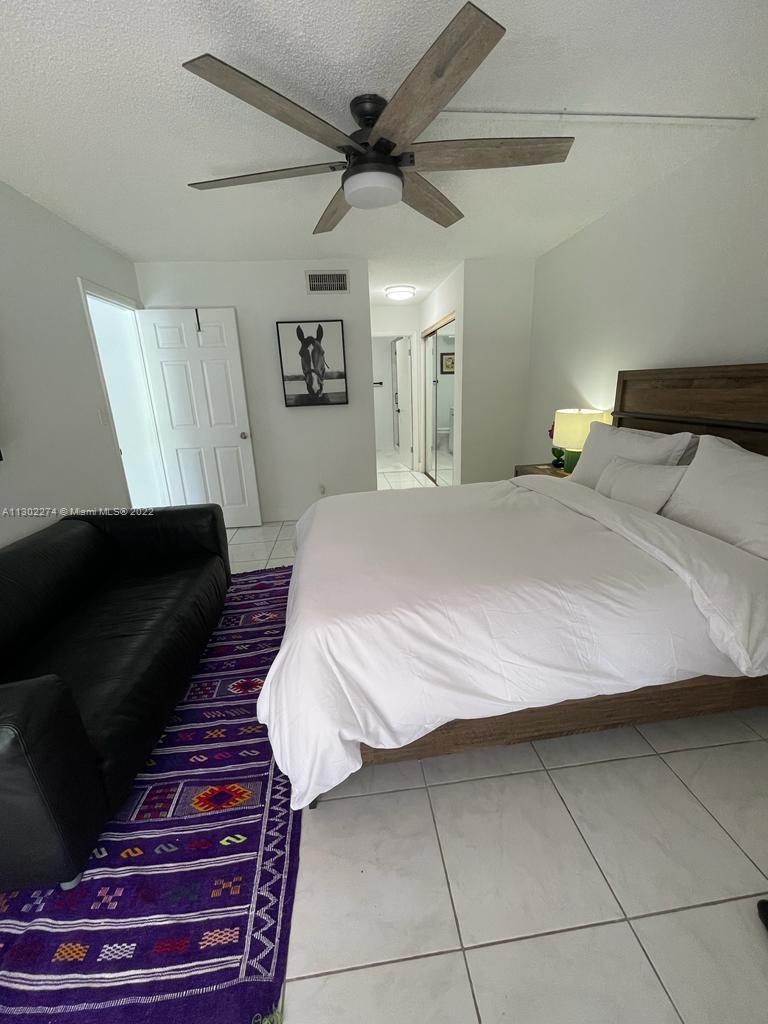 BUILDING FOUR OF RACQUET - Residential Lease