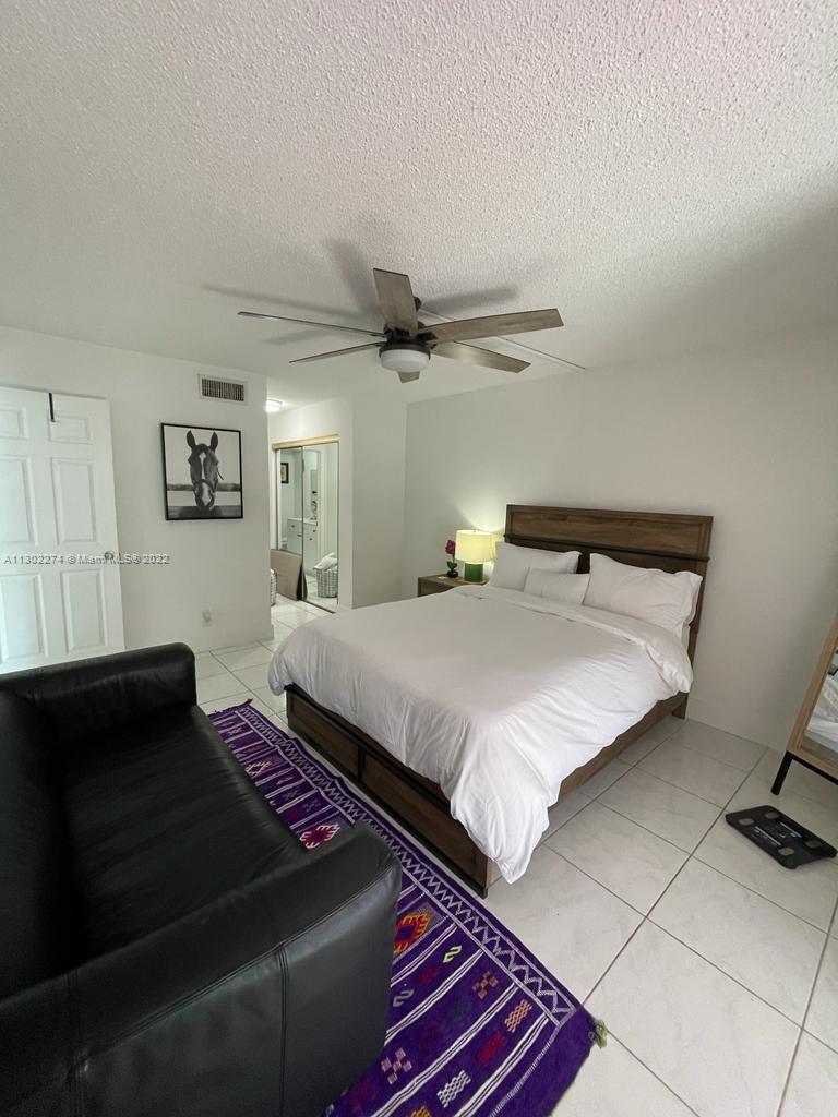 BUILDING FOUR OF RACQUET - Residential Lease