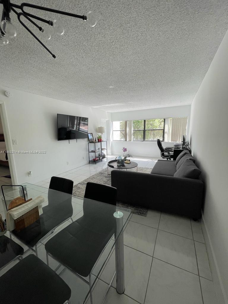 BUILDING FOUR OF RACQUET - Residential Lease