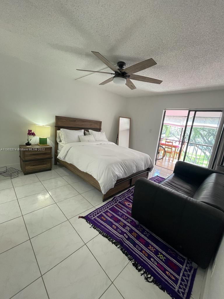 BUILDING FOUR OF RACQUET - Residential Lease