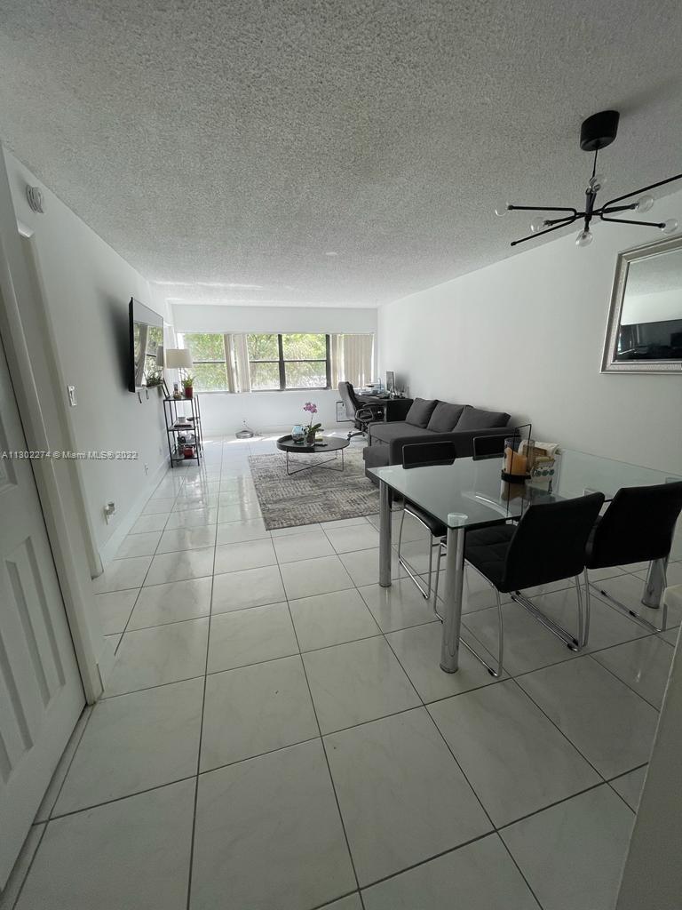 BUILDING FOUR OF RACQUET - Residential Lease
