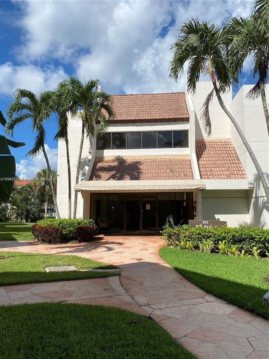 BUILDING FOUR OF RACQUET - Residential Lease