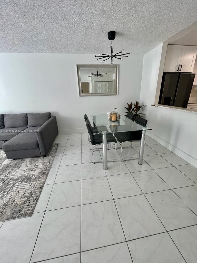 BUILDING FOUR OF RACQUET - Residential Lease