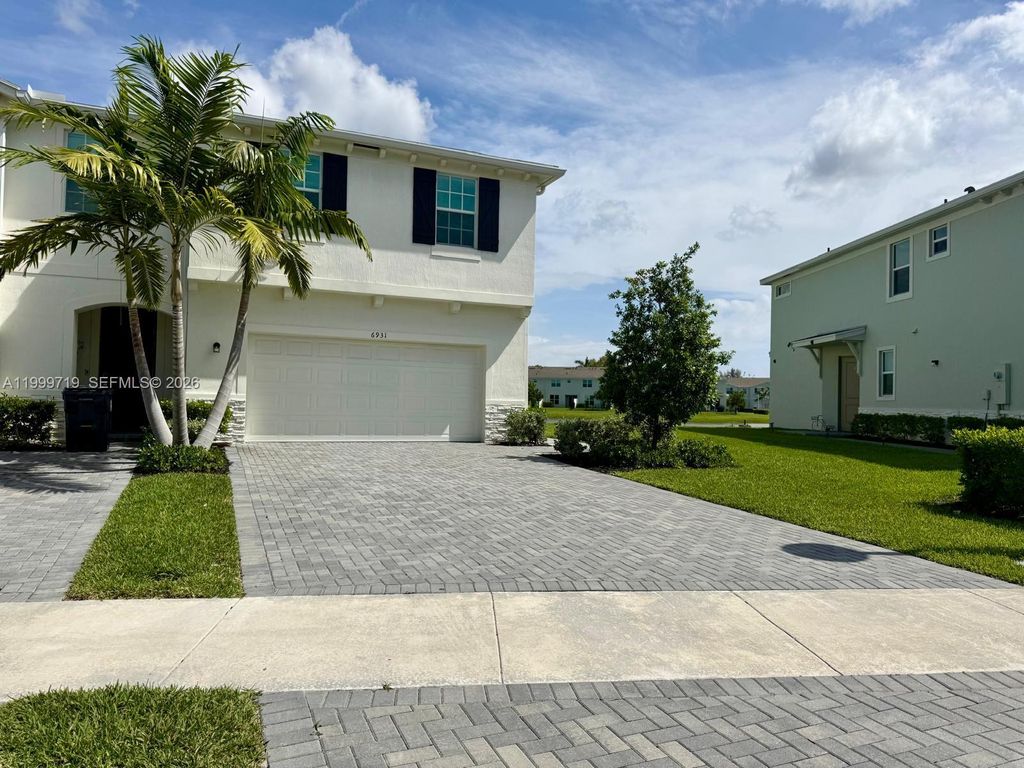 Photo of 6931 Harbours Edge Ave #6931, Lake Worth, FL 33467 (MLS # A11999719)