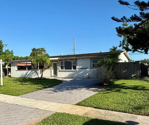Photo of 7681 Farragut St, Hollywood, FL 33024 (MLS # A11874086)