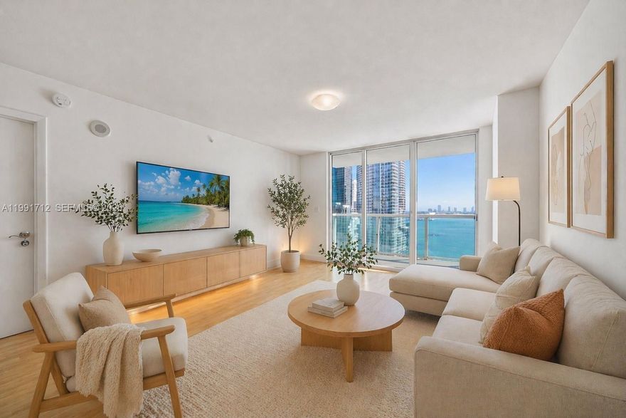 Beautiful 2bed/2bath with water views from every room! Wood floors throughout & porcelain tiles in Refined Brickell living with water views from this 2-bedroom, 2-bath residence at Brickell on the River. Warm wood floors run throughout, complemented by porcelain tile in the kitchen and baths. The kitchen is finished with granite countertops, stainless steel appliances, and a classic subway tile backsplash.

The primary suite offers a spacious closet and double vanity bath, while blackout shades in both bedrooms enhance comfort and privacy. Additional features include a Nest thermostat and designer dining fixture.

Set directly along the Miami River, this full-service building delivers 24-hour valet, business center, and a multi-level fitness and wellness complex with spa, sauna, steam room, and locker facilities. Ideally positioned in the heart of Brickell—just moments from Brickell City Centre, Metromover access, premier dining, and with seamless connectivity to I-95.