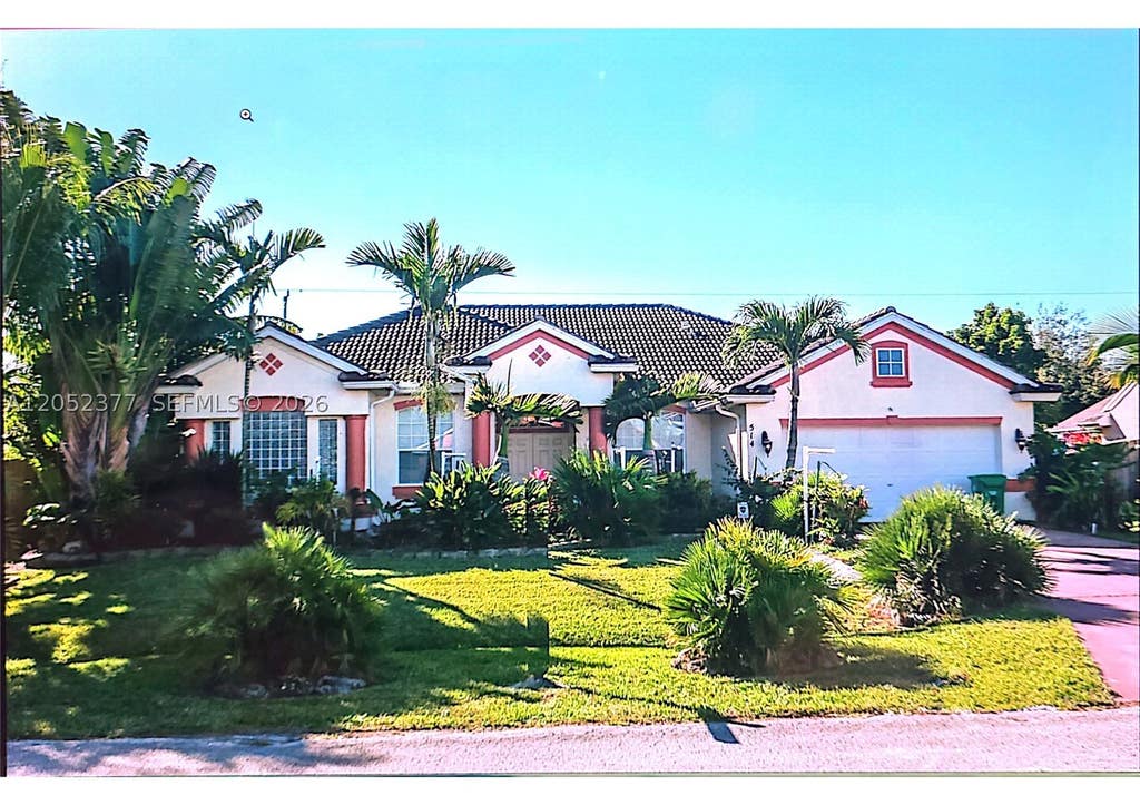 Photo of 514 SW Laconic Ave, Port St Lucie, FL 34953 (MLS # A12052377)