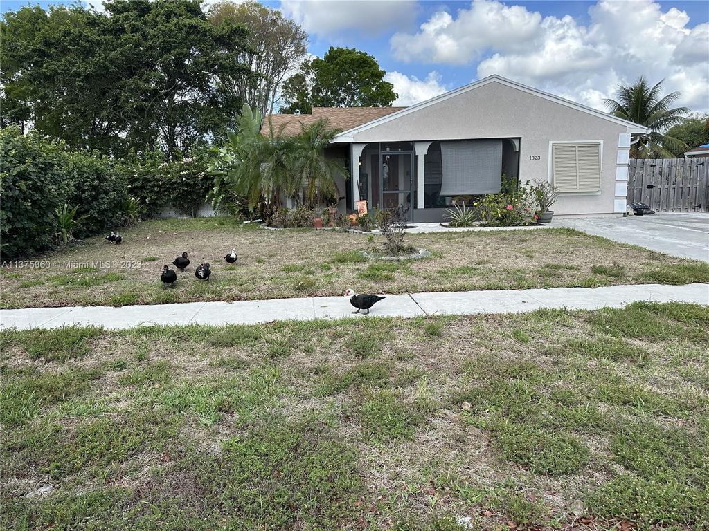 Photo of 1323 Savoyard Way, Royal Palm Beach, FL 33411 (MLS # A11375960)