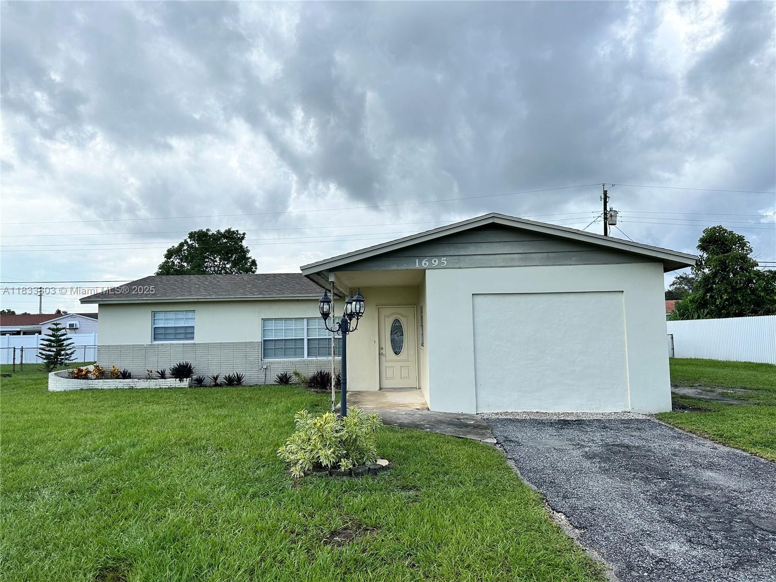 entrally located on a nice quiet neighborhood! The Home was upgraded, This home is completely fence in with 4-ft Grey fence. Large back yard. Plenty parking and is ready to bring the pets over, boat or Motor Home and any other Toy you may have. NO HOA